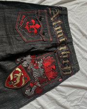 American High Street patchwork monogram embroidered jeans