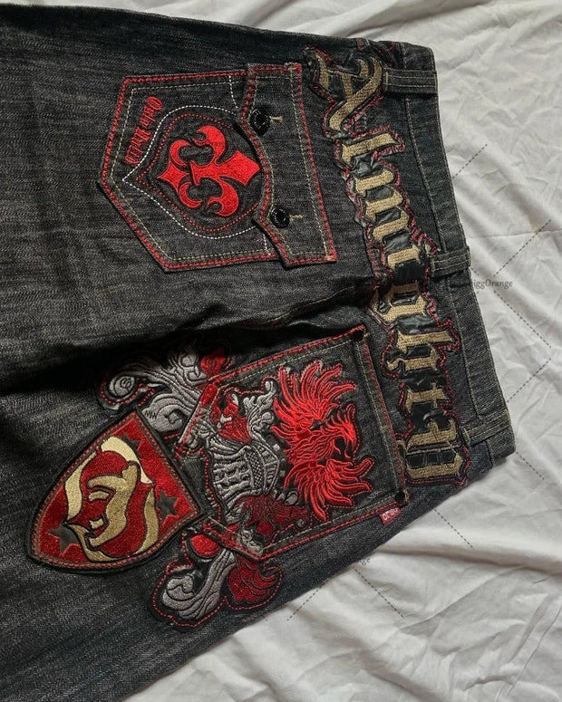 American High Street patchwork monogram embroidered jeans
